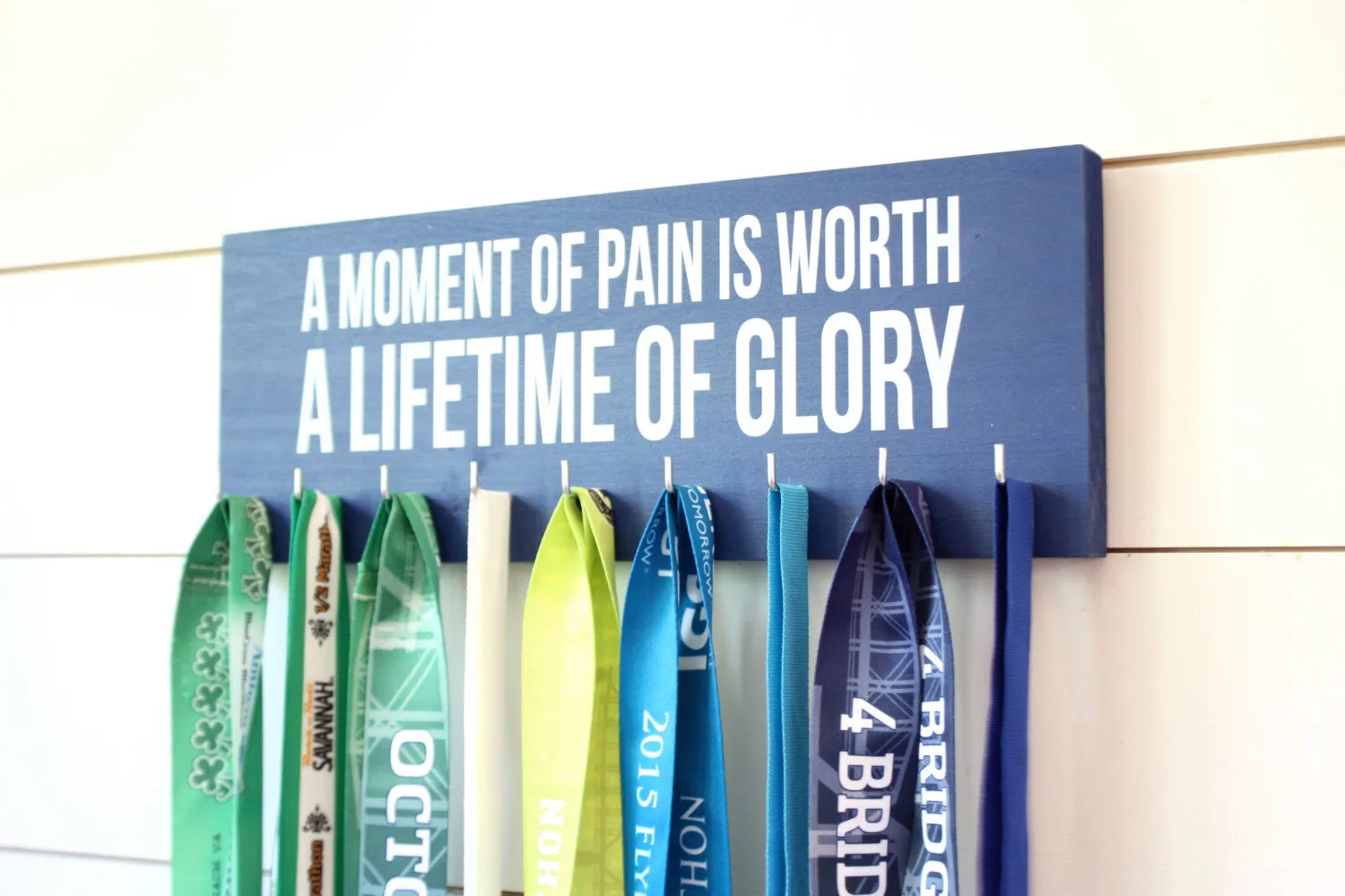 Medal Holder - A moment of pain is worth a lifetime of glory  - Medium - Running / Triathlon / Ironman / Obstacle / Tough Mudder / Spartan