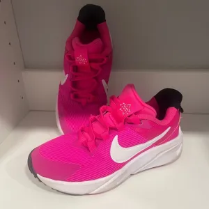 Nike Girls. Star runner. Size 12c, girls.